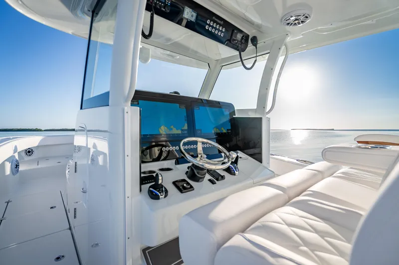 Slide: The Image of 2026 Freeman 35 boat cockpit with modern navigation system and luxurious seating. - 20