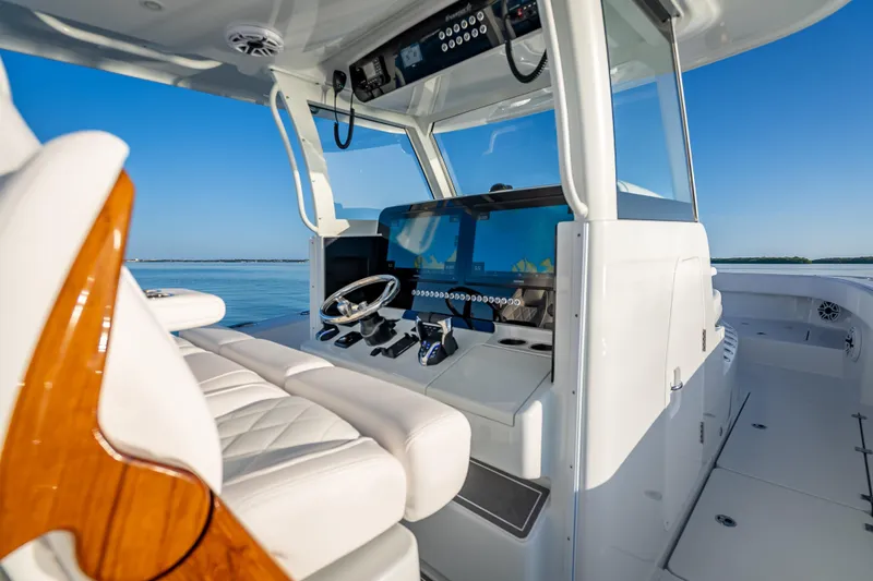 Slide: The Image of 2026 Freeman 35 boat interior with modern helm and luxurious seating. - 22