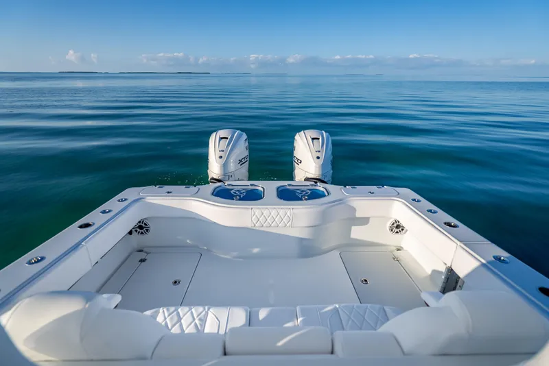 Slide: The Image of 2026 Freeman 35 boat with dual engines on calm ocean waters. - 27