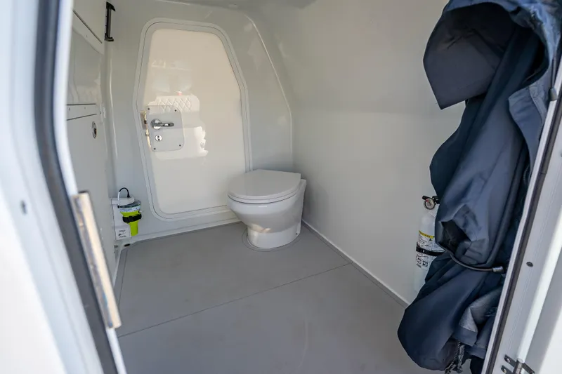 Slide: The Image of Modern bathroom interior in Freeman 35, 2026 model, featuring a sleek toilet and minimalistic design. - 50