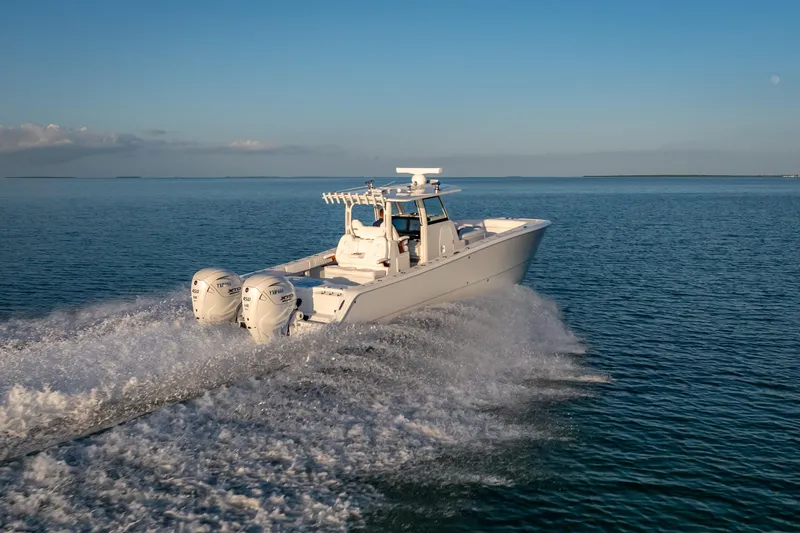 Slide: The Image of 2026 Freeman 35 boat cruising on open water at high speed. - 7