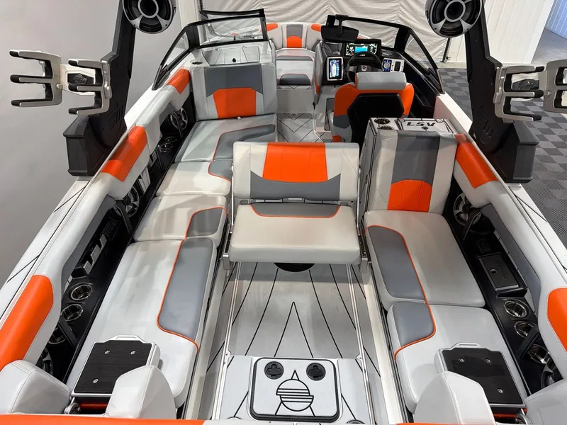 Slide: The Image of Interior of 2021 Malibu Wakesetter 25 LSV with modern seating. - 15