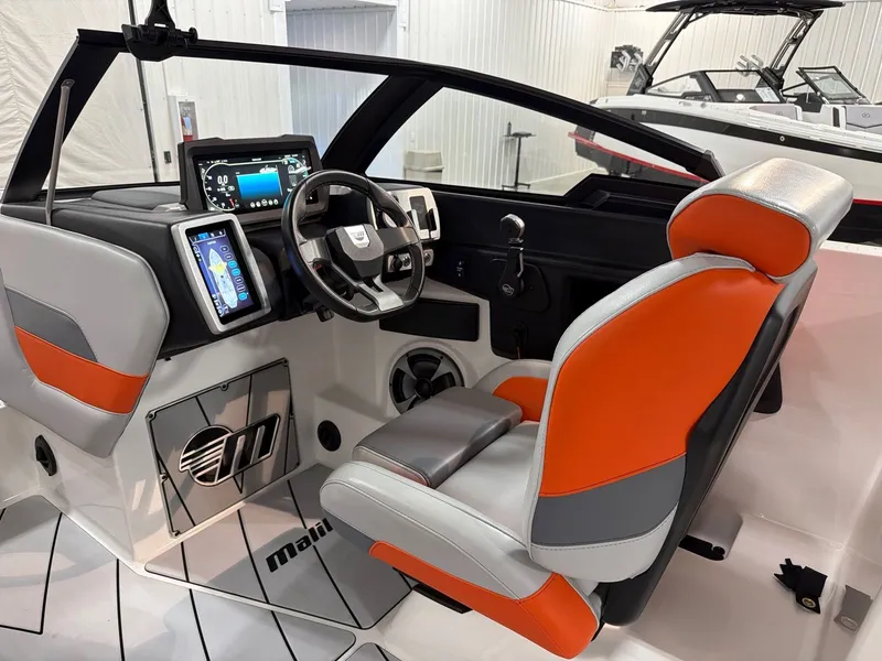 Slide: The Image of Interior of 2021 Malibu Wakesetter 25 LSV with modern helm console. - 18