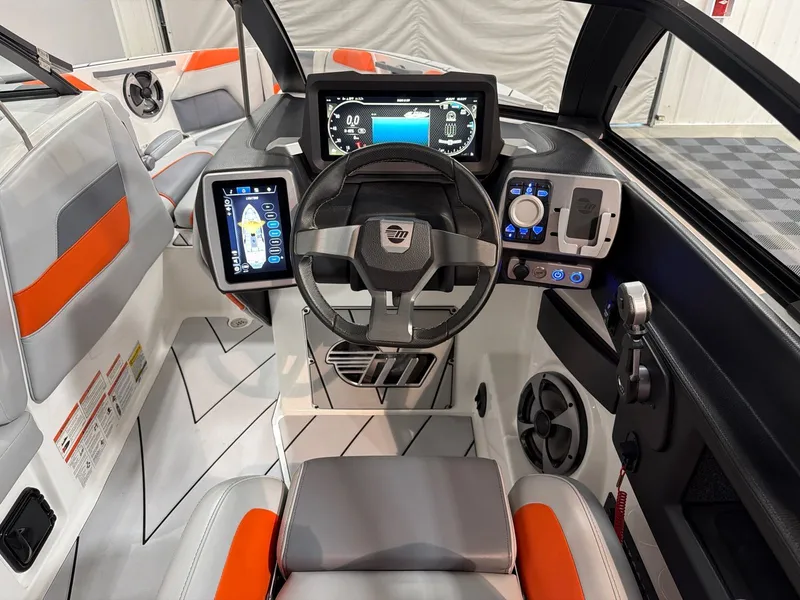Slide: The Image of Interior of 2021 Malibu Wakesetter 25 LSV with modern control console. - 19