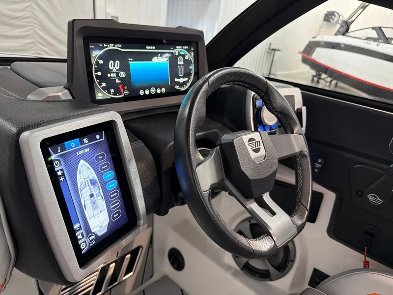 Slide: The Image of Interior of 2021 Malibu Wakesetter 25 LSV with modern controls. - 20