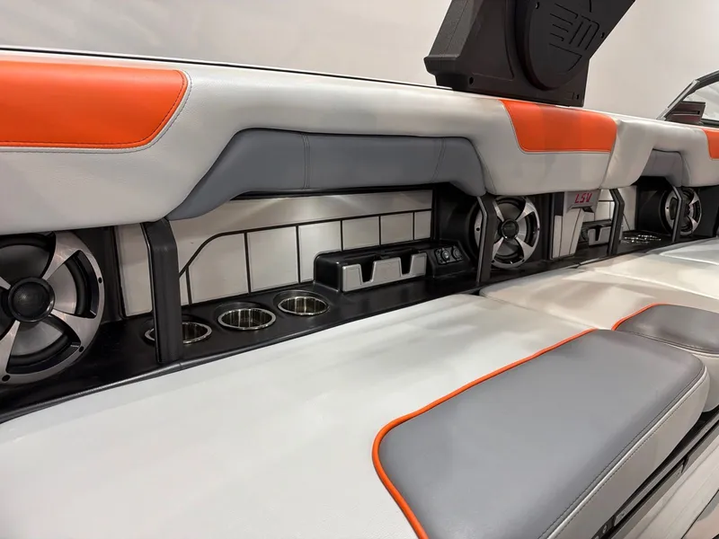 Slide: The Image of Interior of 2021 Malibu Wakesetter 25 LSV with speakers and cup holders. - 22