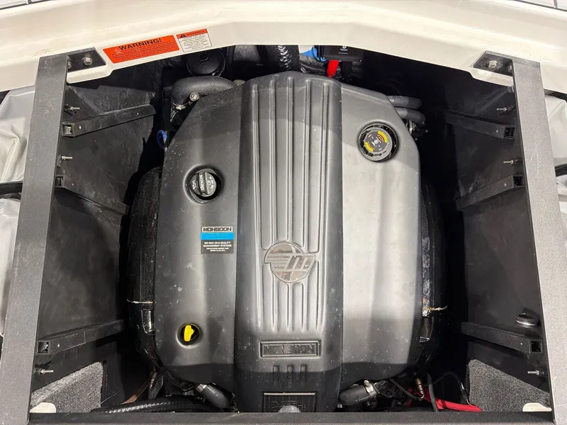 Slide: The Image of Engine compartment of 2021 Malibu Wakesetter 25 LSV with Monsoon engine. - 27