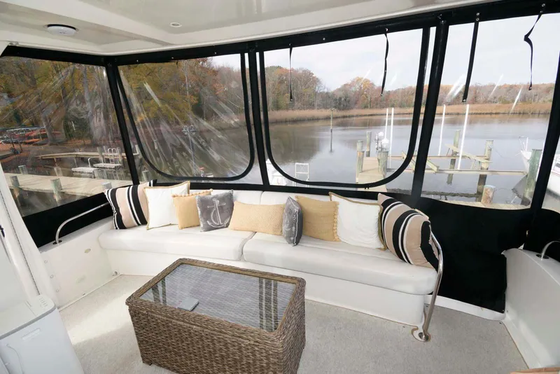 Slide: The Image of Luxurious 2007 Carver 43 Motor Yacht interior with scenic water view. - 12