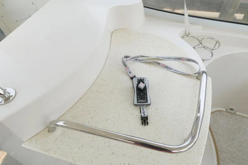 Slide: The Image of Remote control on the counter of a 2007 Carver 43 Motor Yacht. - 13