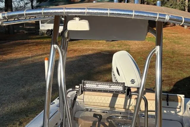 Slide: The Image of 2023 Sea Chaser 21 LX boat with T-top and Suzuki outboard motor. - 7