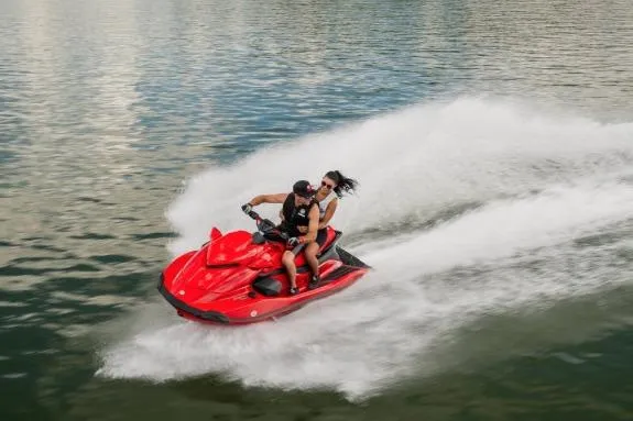 Slide: The Image of 2026 Yamaha WaveRunner GP SVHO speeding on water with two riders. - 2