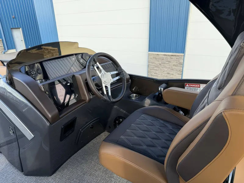 Slide: The Image of Interior of 2026 Bennington 25 RTSBA with modern helm. - 31