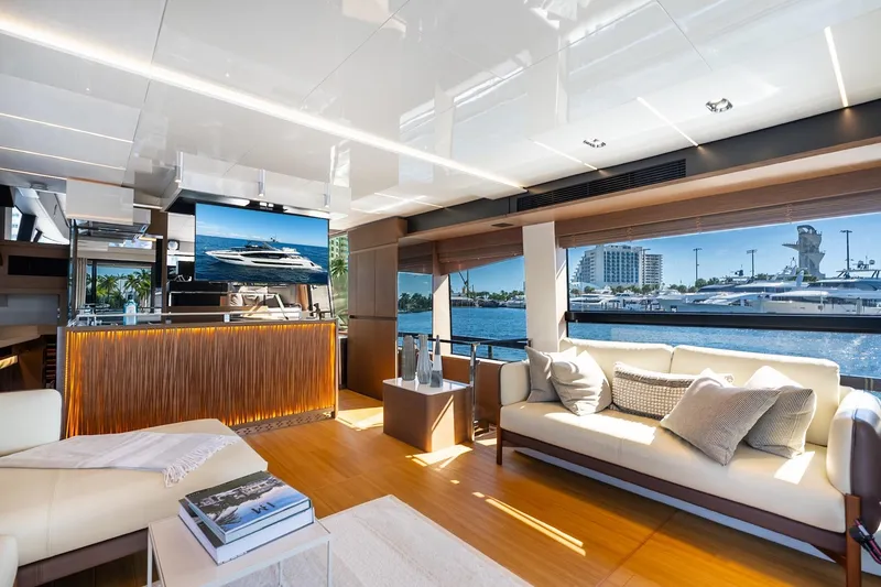 Slide: The Image of Luxurious interior of 2022 Prestige X70 yacht with modern furnishings and waterfront view. - 31