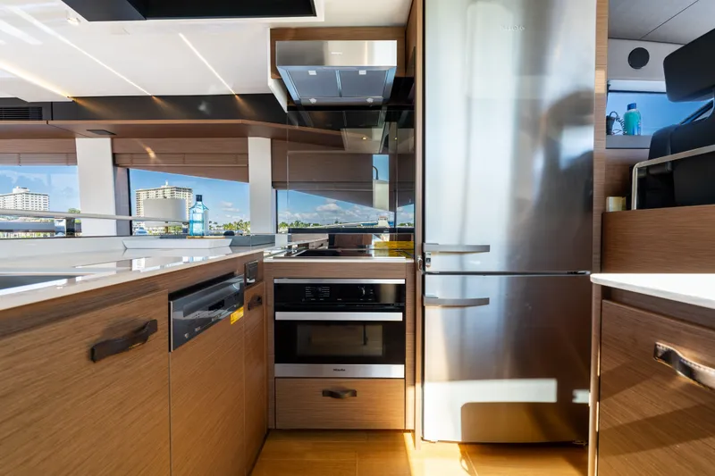 Slide: The Image of Modern kitchen interior on 2022 Prestige X70 yacht with stainless steel appliances. - 39