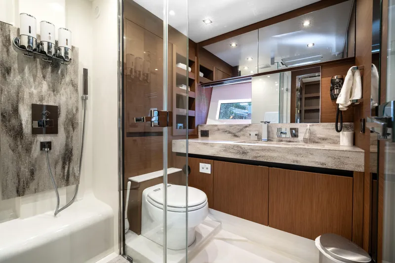 Slide: The Image of Luxurious bathroom in 2022 Prestige X70 yacht, featuring modern fixtures and elegant design. - 50