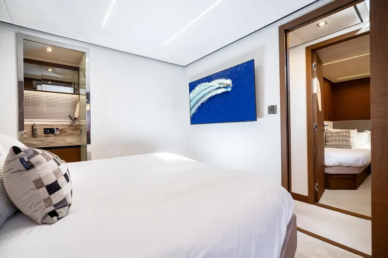 Slide: The Image of Luxurious bedroom interior of 2022 Prestige X70 yacht with modern decor and elegant design. - 56