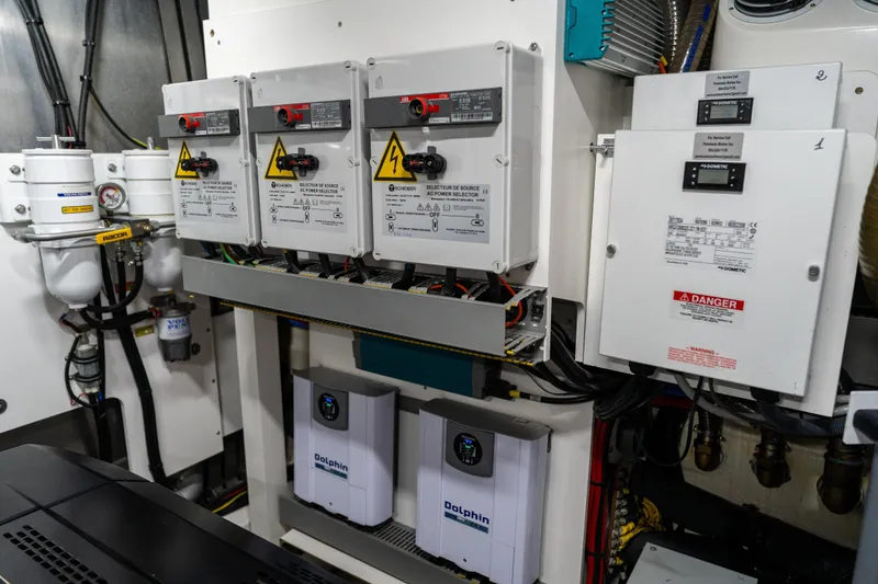 Slide: The Image of Electrical control panel in a 2022 Prestige X70 yacht engine room. - 67