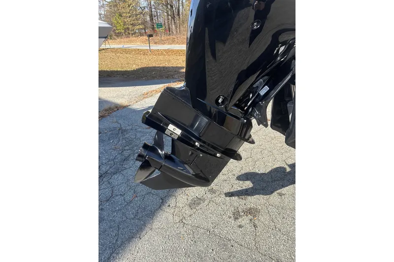 Slide: The Image of 2023 Sea Ray SPX 210 Outboard motor, black finish, on a sunny day. - 26