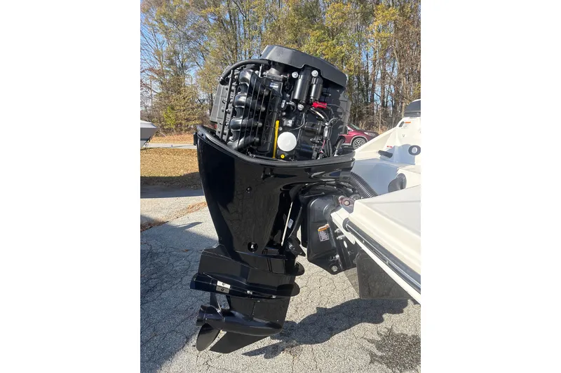 Slide: The Image of 2023 Sea Ray SPX 210 Outboard engine, detailed view in outdoor setting. - 27
