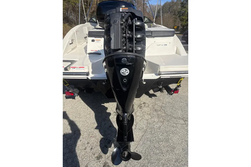Slide: The Image of 2023 Sea Ray SPX 210 Outboard boat with powerful engine, rear view. - 28