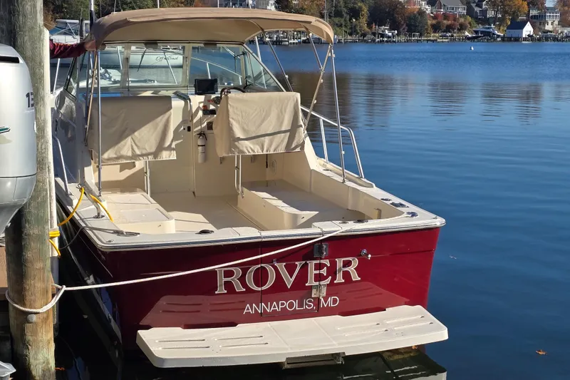 Slide: The Image of 2001 Mainship 30 Pilot Rum Runner boat docked in Annapolis, MD. - 9