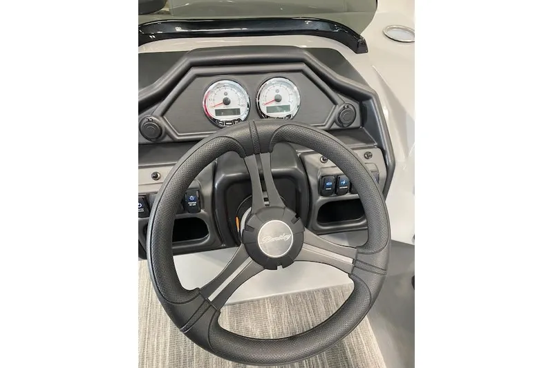 Slide: The Image of Steering wheel and dashboard of 2026 Bentley Pontoons Legacy 223 Navigator. - 12