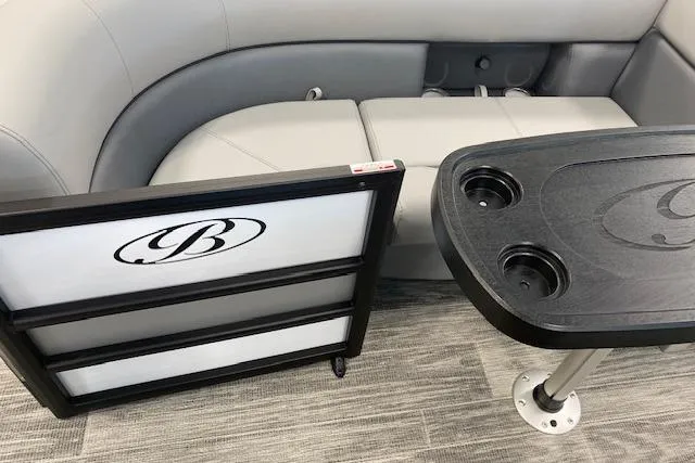 Slide: The Image of 2026 Bentley Pontoons Legacy 223 Navigator interior with seating and table detail. - 5