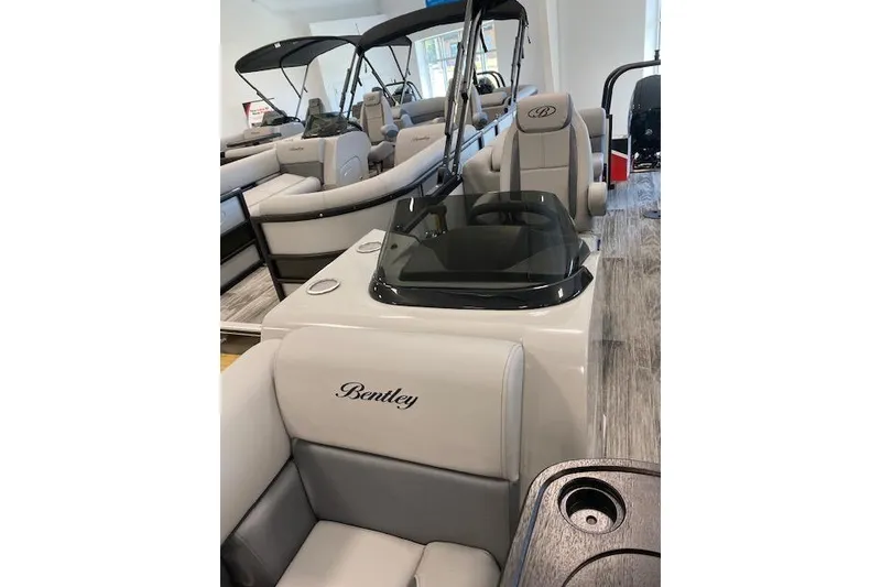 Slide: The Image of 2026 Bentley Pontoons Legacy 223 Navigator interior with luxurious seating and modern design. - 8