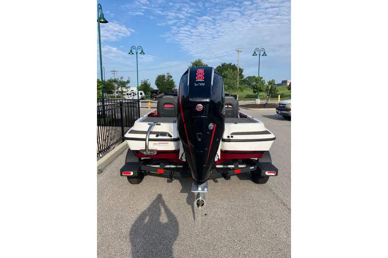 Slide: The Image of 2026 Nitro Z19 XL boat with powerful V8 engine, parked outdoors on a sunny day. - 4