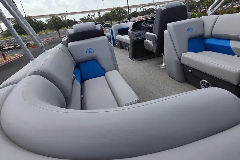 Slide: The Image of 2026 Sun Tracker Party Barge 22 DLX interior with plush seating and modern design. - 8