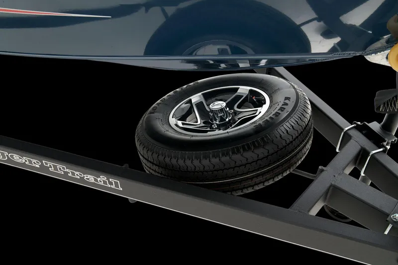 Slide: The Image of 2026 Ranger VS1782SC Reata boat storage compartment with open lid, showcasing interior space. - 16