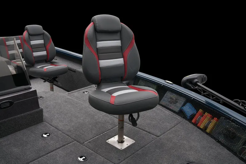 Slide: The Image of 2026 Ranger VS1782SC Reata boat interior with open storage compartment and two seats. - 27