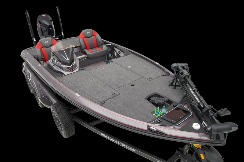 Slide: The Image of 2026 Ranger Z519R boat storage compartment with carpeted interior and logo. - 13