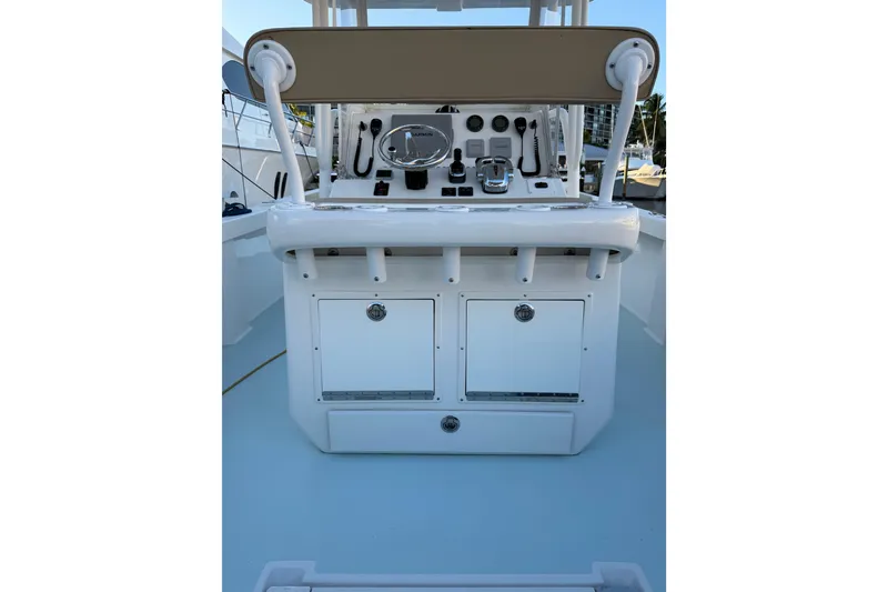 Slide: The Image of 2015 Albury Brothers 27 boat console with controls and storage compartments. - 10