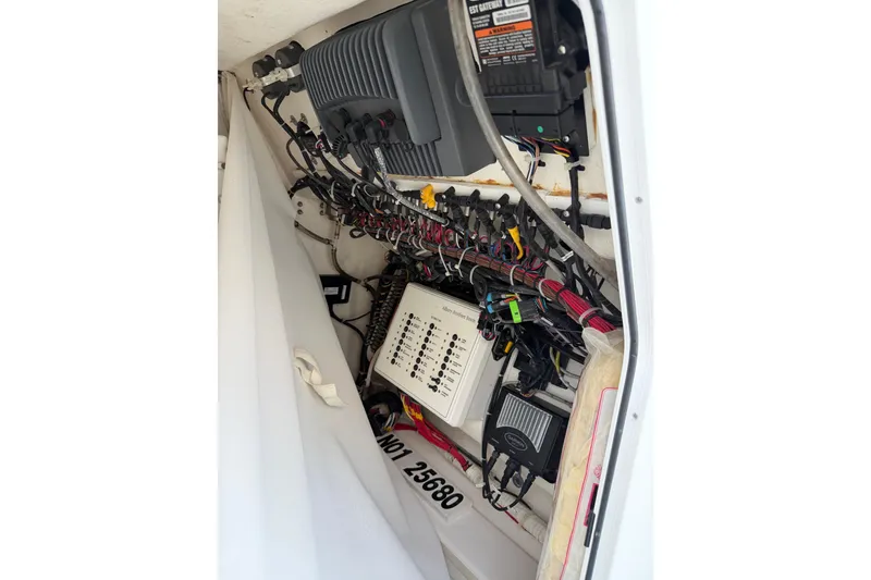 Slide: The Image of Electrical wiring and components inside a 2015 Albury Brothers 27 boat. - 15