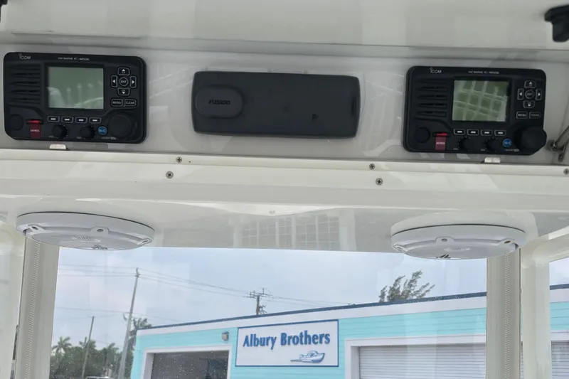 Slide: The Image of 2015 Albury Brothers 27 boat storage compartment with open door and organized trays. - 17