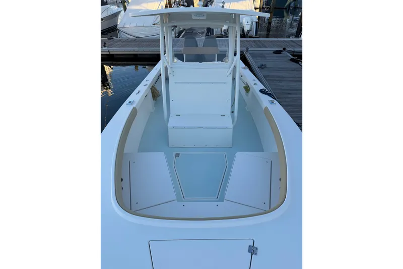 Slide: The Image of 2015 Albury Brothers 27 boat, spacious deck, docked at marina. - 6