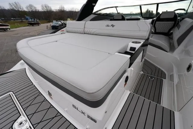Slide: The Image of 2026 Sea Ray SLX 260 boat with sleek seating and modern design. - 15