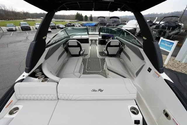 Slide: The Image of 2026 Sea Ray SLX 260 boat interior with luxurious seating and modern design. - 17