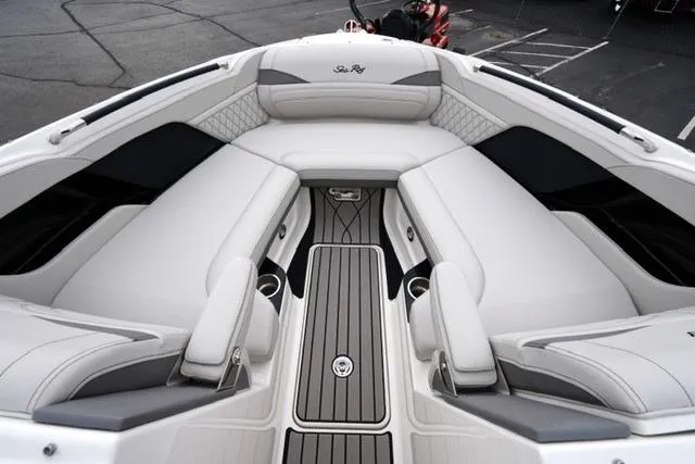 Slide: The Image of Luxurious interior of 2026 Sea Ray SLX 260 boat with plush seating and sleek design. - 18