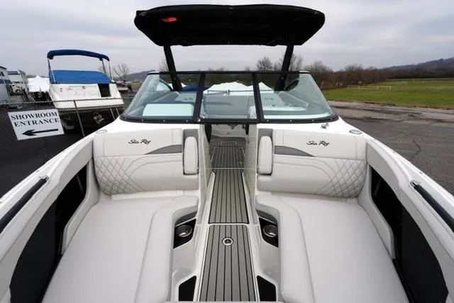 Slide: The Image of 2026 Sea Ray SLX 260 boat interior with luxurious seating and sleek design. - 21