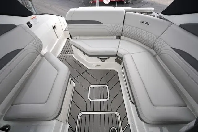Slide: The Image of Interior seating of 2026 Sea Ray SLX 260 boat with elegant gray upholstery. - 27