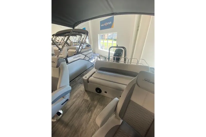 Slide: The Image of 2026 Bentley Pontoons Legacy 223 Swingback interior with seating and canopy. - 11