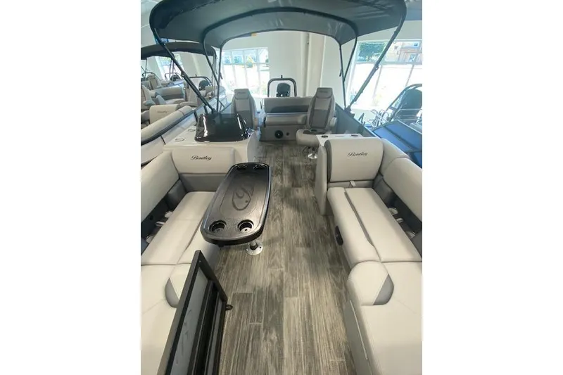 Slide: The Image of 2026 Bentley Pontoons Legacy 223 Swingback interior with luxurious seating and modern design. - 17
