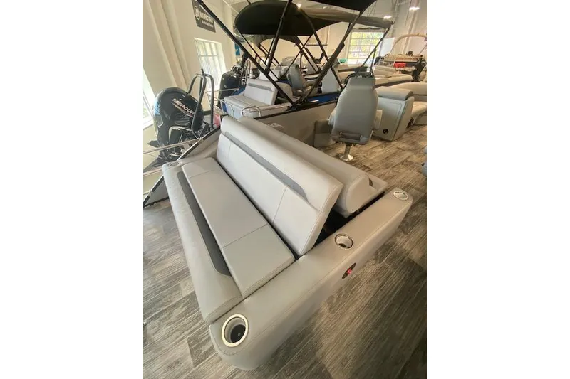 Slide: The Image of 2026 Bentley Pontoons Legacy 223 Swingback with luxurious seating and modern design. - 5