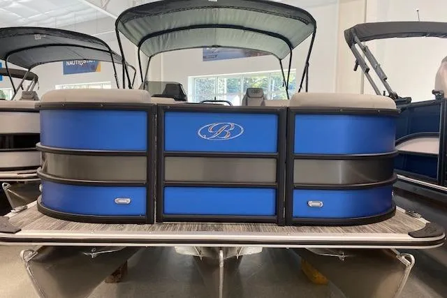 The Image of 2026 Bentley Pontoons Legacy 223 Swingback, blue and gray design, displayed indoors. - 1