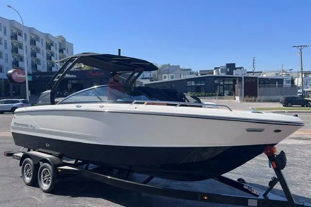 The Image of 2025 Chaparral 247 SSX boat on trailer in urban setting. - 0