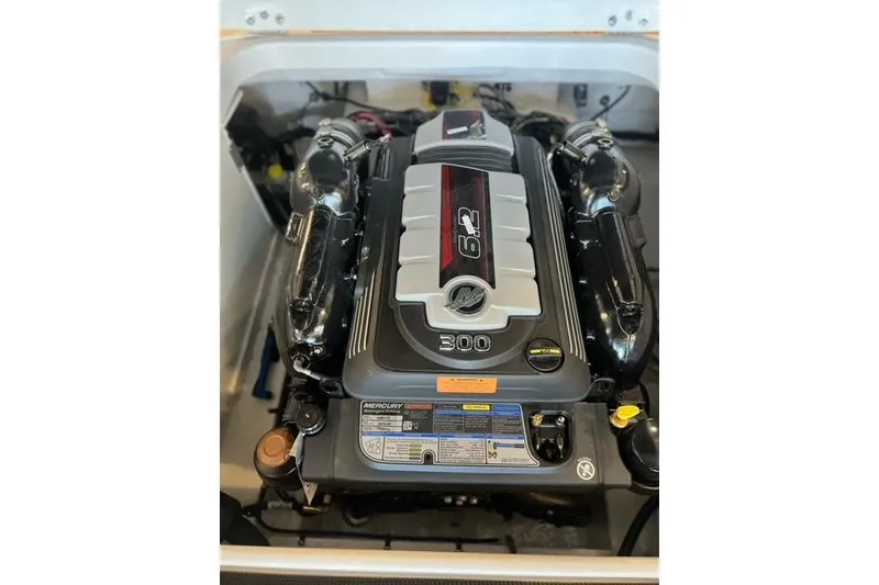Slide: The Image of 2025 Chaparral 247 SSX boat engine, featuring a 6.2L Mercury 300 horsepower motor. - 32