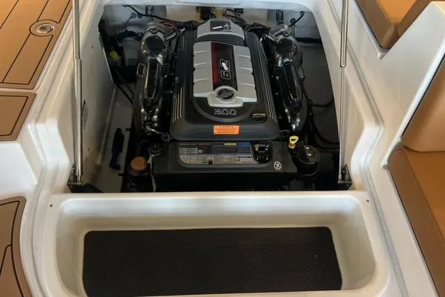 Slide: The Image of Engine compartment of 2025 Chaparral 247 SSX boat, showcasing powerful 6.2L engine. - 33