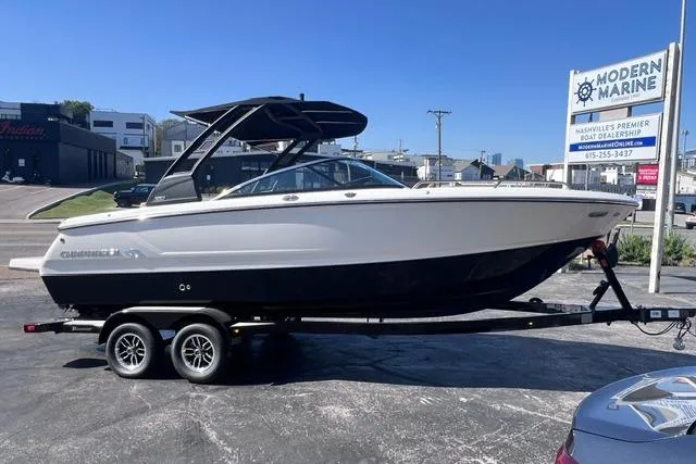 Slide: The Image of 2025 Chaparral 247 SSX boat on trailer at Modern Marine dealership. - 4